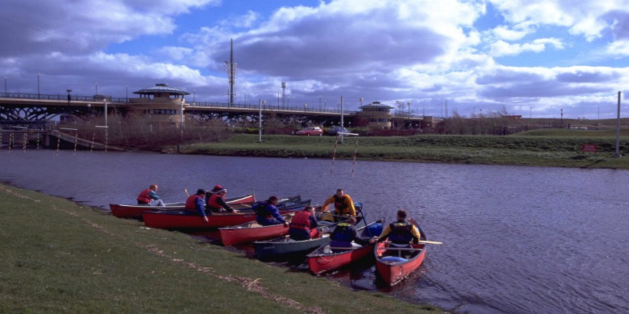 Kayaks on River Tees with Tees Barrage in background
