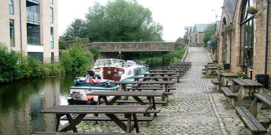 Boat moored outside White Cross Pub on Lancaster Canal