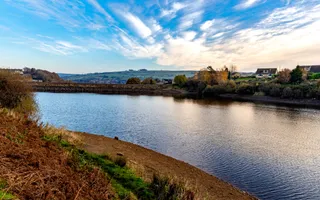 wide shot of a reservoir during sunset or sunrise