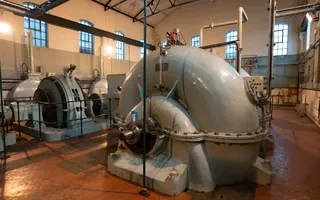 Inside a building with large pumps