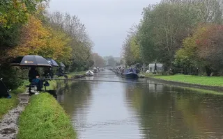 People fishing in the rain, in Norbury, along Shropshire Union Canal