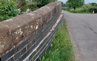 Clode up of damage brick work on a bridge
