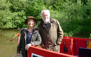 Timothy West and Prunella Scales on a narrowboat