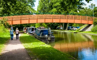 A family walking along the towpath