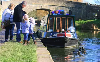 Family feeding the ducks