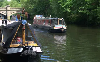 Boats moored on towpath