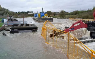 Machinery dealing with flooding on the River Soar