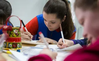 Young person colouring in