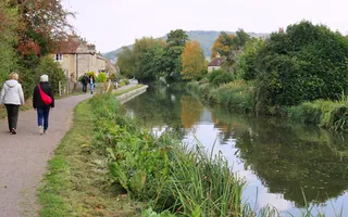 Friends walking along the canal