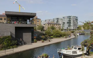 Wide shot of a canal in an urban area on a sunny day