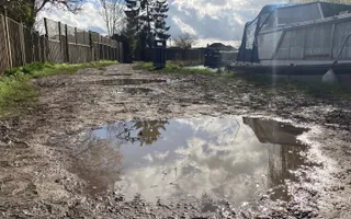 A muddy puddle on a path