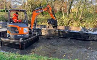 Digger on a canal