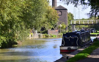 Boat moored in the shade on the Coventry Canal