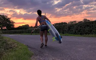 From her first lesson, Eve loved paddling and decided to buy her own board