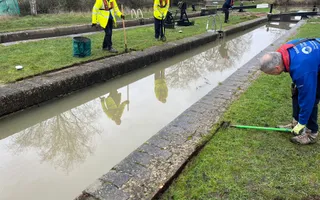 Group of people by the canal water