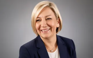 Blonde woman posing for photo