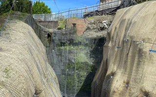 Rocky walls with netting around it
