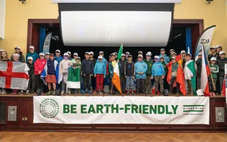 young anglers all standing on stage with their country's flag