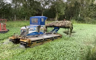 Specialist boats help lift floating pennywort from our canals