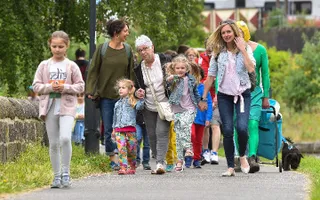 Family and friends walking along the towpath