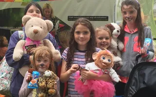 group of shildren with teddy bears