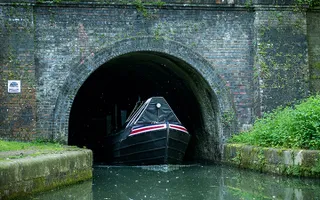 Boat coming out of Blisworth Tunnel, Stoke Bruerne