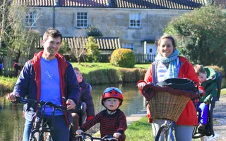 Family on canal bike ride