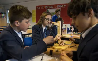 School children crafting as a group