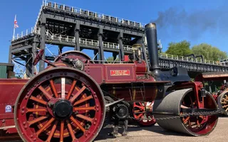 Old steam engine infront of boat lift