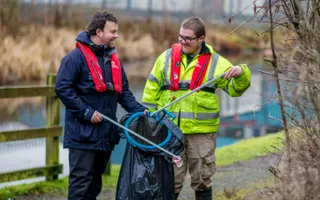 Volunteers litter picking by the canal
