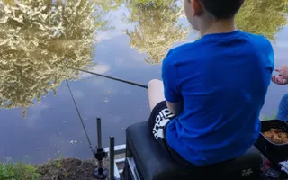 Helen coaching Let's Fish! pupil