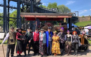 Group of people dressed in steam punk outfits