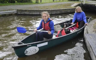 Two people in a Canadian Canoe
