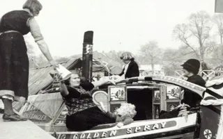 Black and white photo of ladies on narrowboat Golden Spray