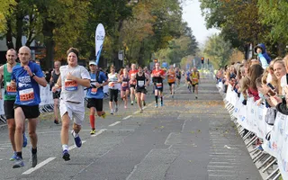 Crowds complete a running event