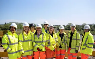 A group of women in ppv posing for a photo
