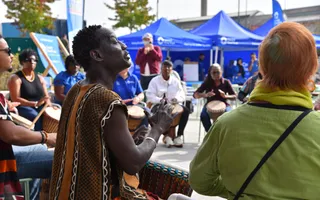 Group of people playing the bongo