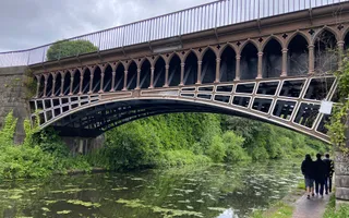 A photograph of the cast iron Engine Arm Aqueduct, an ornate structure crossing the New mainline canal