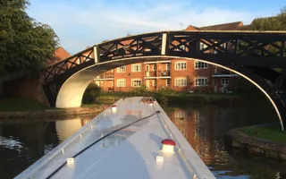 A narrowboat negotiating Hawksbury Junction