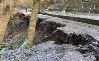 frosty morning showing canal embankment that has slipped away