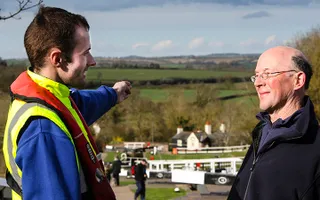 Volunteer directing customer at Foxton Locks