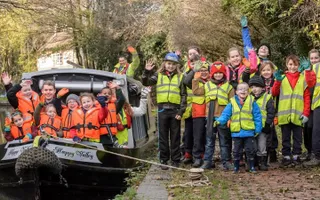 1st Billesley Scout group waving at the camera on the North Stratford Canal
