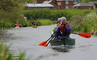 People canoeing along the Montgomery Canal
