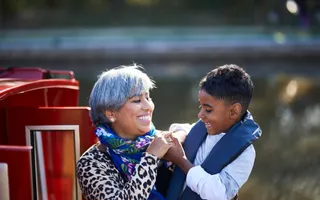A mother and child together by the canal