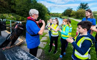 Man teaching group of children