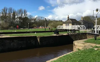 A large lock pound next to a smaller lock