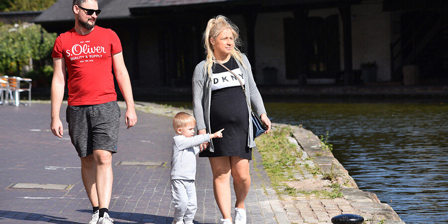 Family walking at Coventry Canal Basin