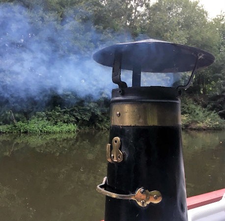 Smoking boat chimney