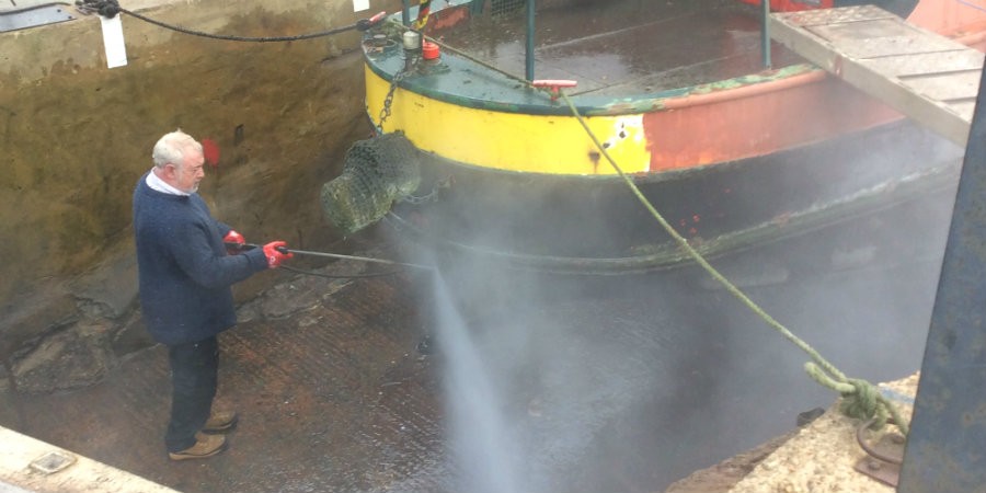 Pressure washing a narrowboat