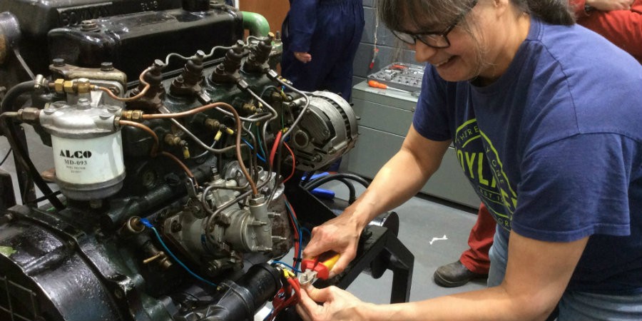 Repairing boat engine electrics
